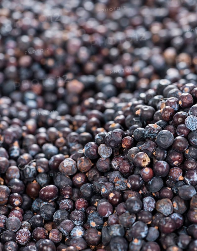 Heap of dried Juniper Berries for use as background image (close-up image)