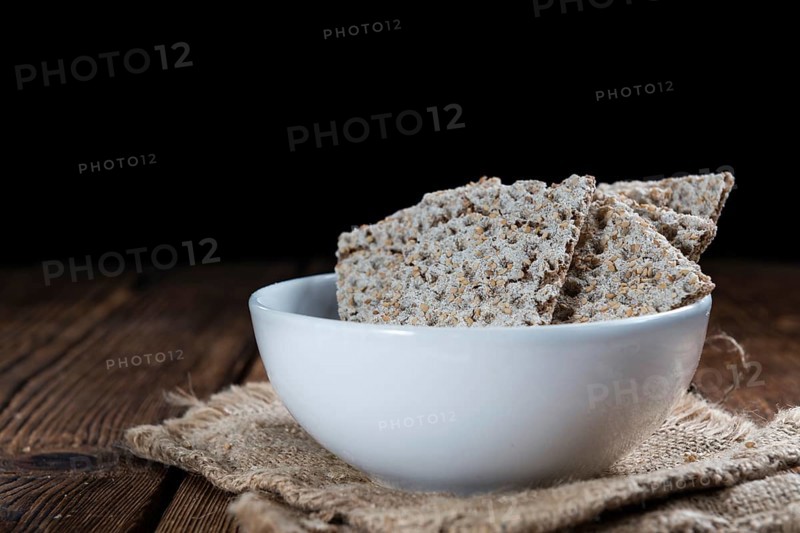 Crispbread (selective focus) on an vintage wooden table
