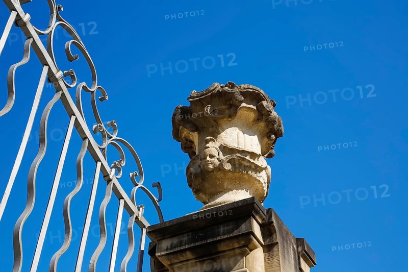 Stadion Castle Bonnigheim, detail, wall end, decorative element on wall, fence, vase-like stone sculpture, relief, face, building, architecture, historical building, late Baroque style, master builder Anton Haaf, built in 1756 by order of Imperial Count Anton Heinrich Friedrich von Stadion, Minister and Chancellor of the Archbishop and Elector of Mainz, country castle, summer residence, window, white shutters, roof, Bonnigheim, Ludwigsburg district, Baden-Württemberg, Germany, Europe