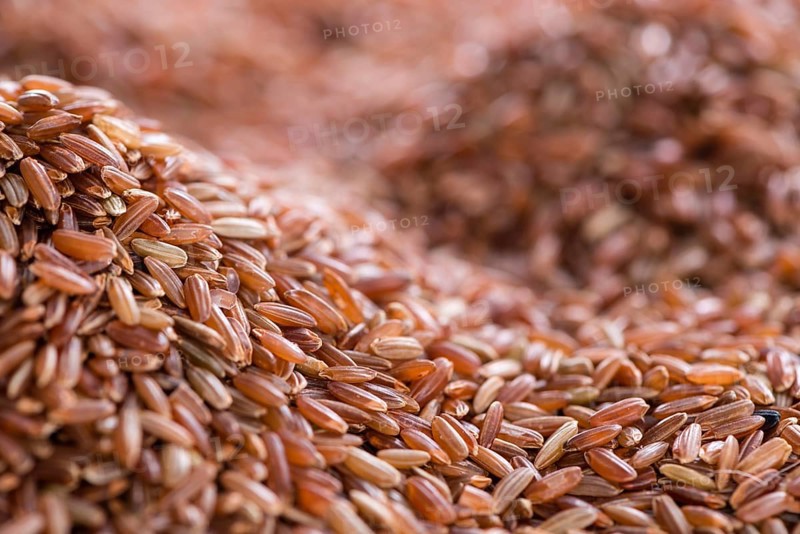 Portion of red Rice as detailed close-up shot for use as background image or as texture
