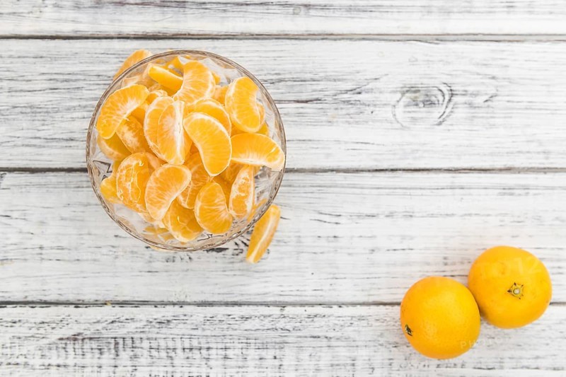 Portion of raw tangerines as detailed close-up shot (selective focus)