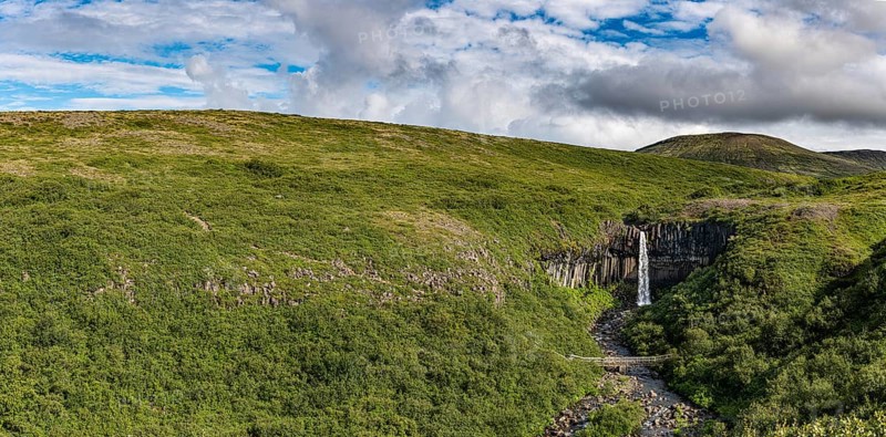 Svartifoss waterfall in the Skaftafell National Park Iceland during a summer day