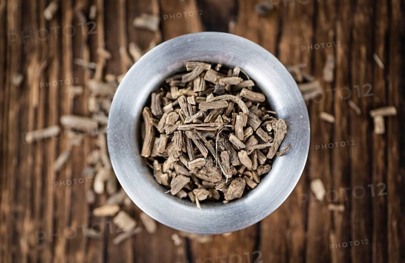 Valerian Roots on a wooden table (detailed close-up shot)
