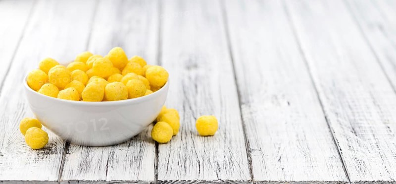 Portion of fresh made Cheese Balls (close-up shot, selective focus)