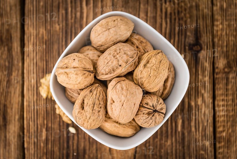 Portion of fresh Walnuts (close-up shot, selective focus)