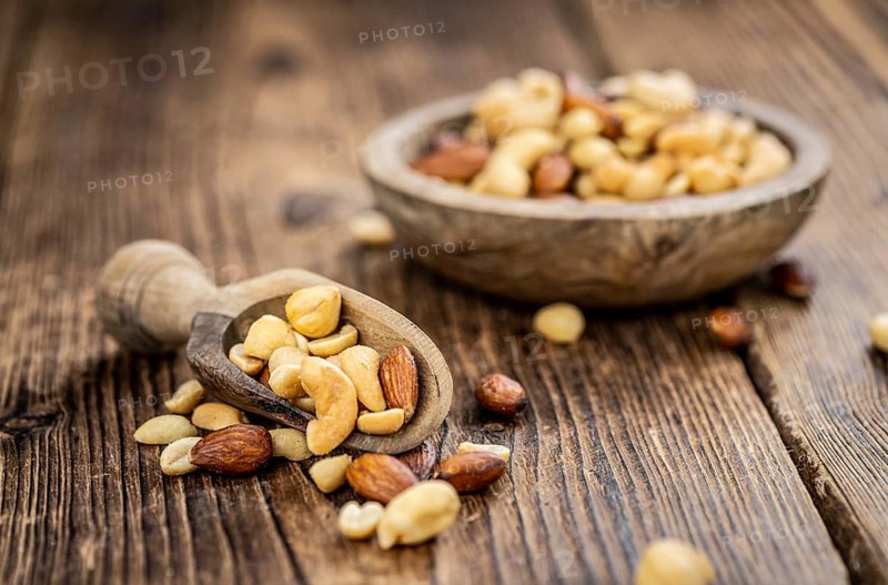 Portion of roasted nuts as detailed close up shot (selective focus)