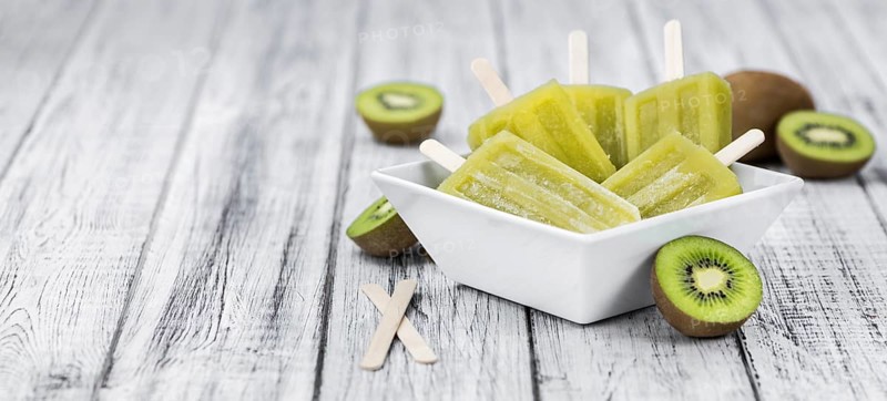 Kiwi Popsicles (fresh) as detailed close-up shot, selective focus)