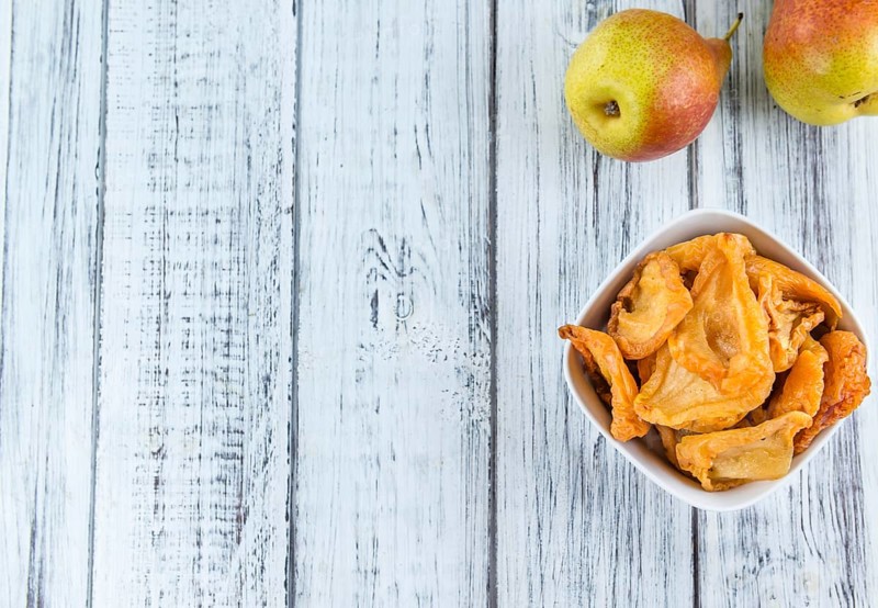 Bowl with dried Pears (close-up shot, selective focus)