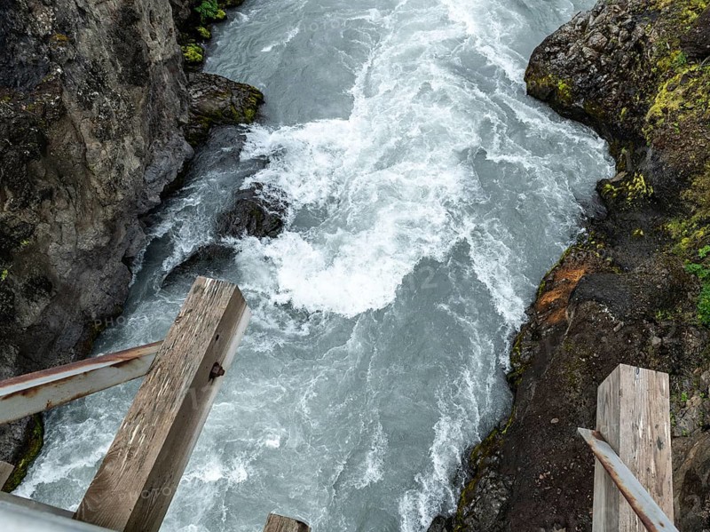 Hraunfossar waterfall in western Iceland at a cloudy day