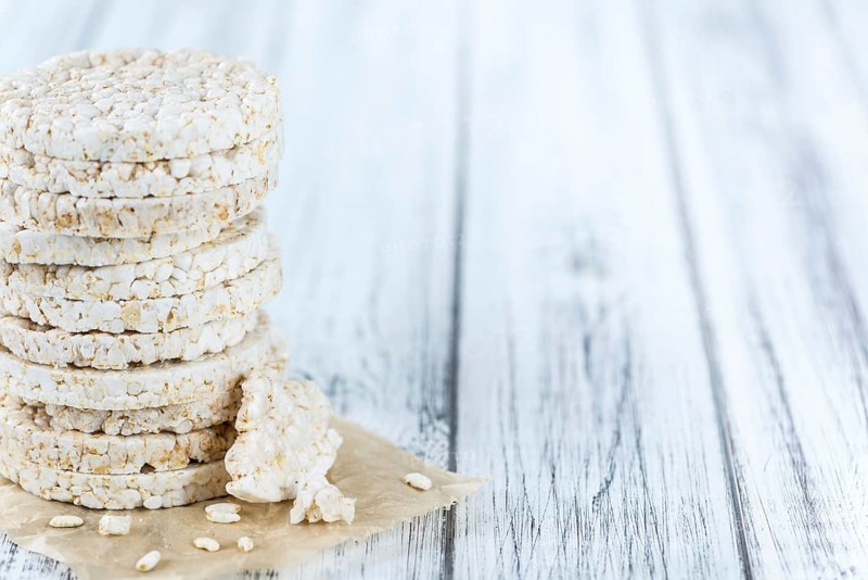 Some Rice Cakes (close-up shot) on an old wooden table