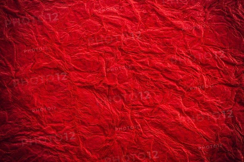 Background surface of wrinkled red and crumpled paper