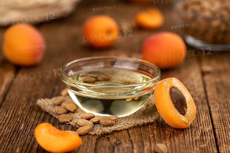 Some Apricot Kernel Oil as detailed close up shot (selective focus)