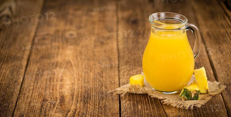 Some homemade Pineapple Juice as detailed close-up shot, selective focus