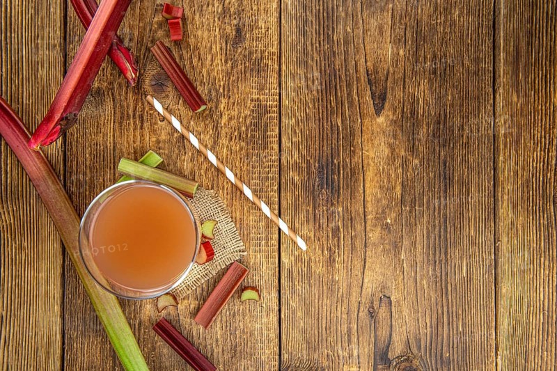 Portion of fresh made Rhubarb Juice (close up shot, selective focus)