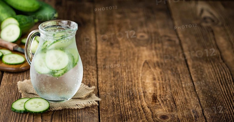 Homemade Cucumber Water on vintage background selective focus, close-up shot