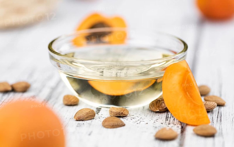 Apricot Kernel Oil as detailed close up shot (selective focus)