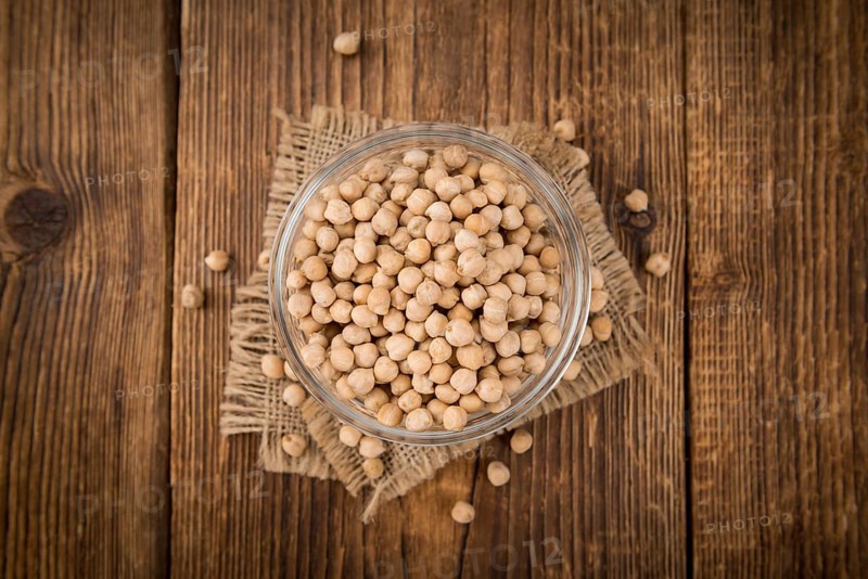 Portion of fresh Chickpeas close-up shot, selective focus