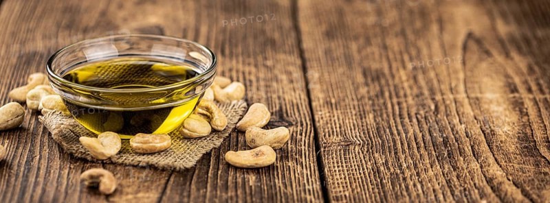 Portion of Cashew Oil (detailed close up shot, selective focus)