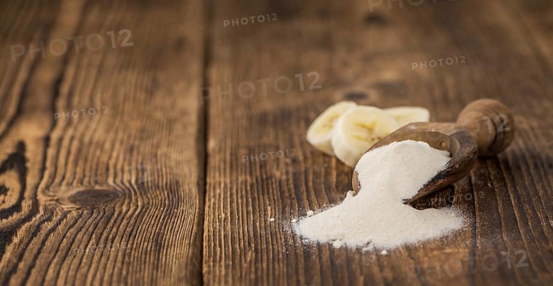 Banana Powder on a vintage background as detailed close-up shot, selective focus