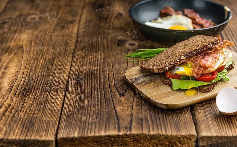 Fresh made Bacon and Egg Sandwich (selective focus, close-up shot)