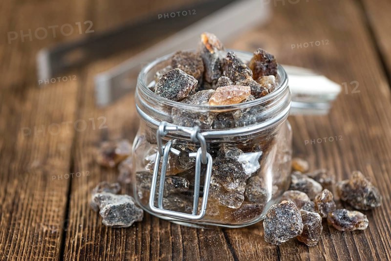 Portion of brown Rock Candy as detailed close-up shot (selective focus)