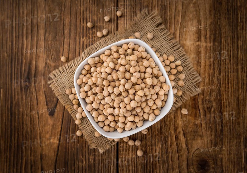 Portion of fresh Chickpeas close-up shot, selective focus