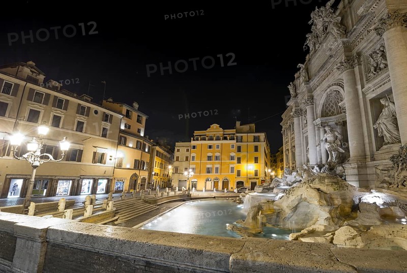 Beautiful Trevi Fountain and Building at Night in City of Rome, Lazio, Italy, Europe