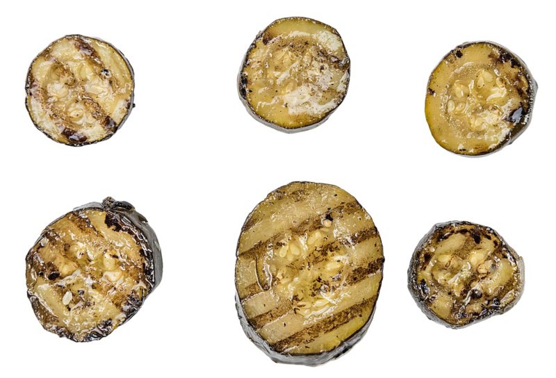 Antipasti (Grilled Zucchinis) isolated on white background (selective focus, close-up shot)
