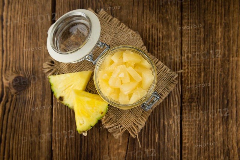 Portion of fresh Preserved Pineapple pieces close-up shot, selective focus