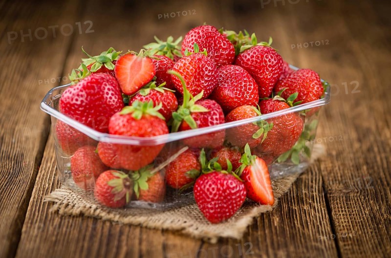 Portion of fresh Strawberries close-up shot, selective focus
