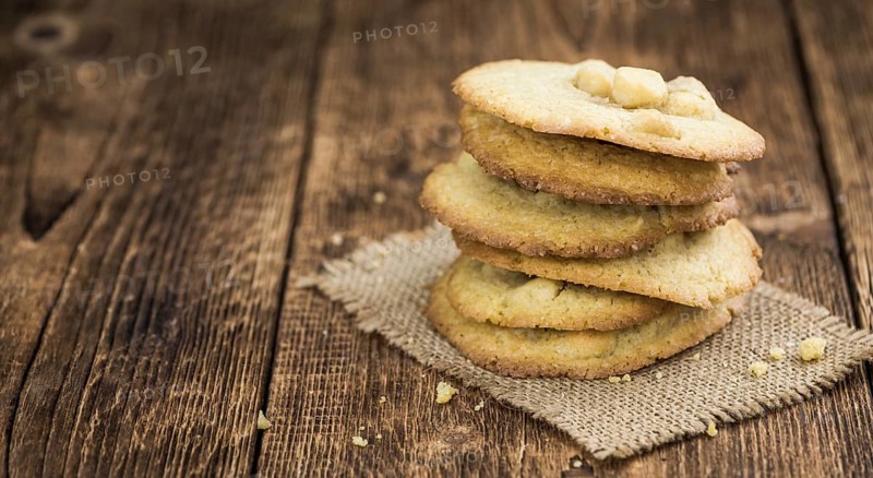 Portion of Macadamia Cookies as detailed close-up shot, selective focus