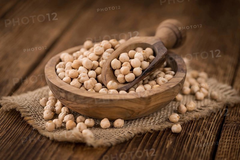 Portion of fresh Chickpeas close-up shot, selective focus