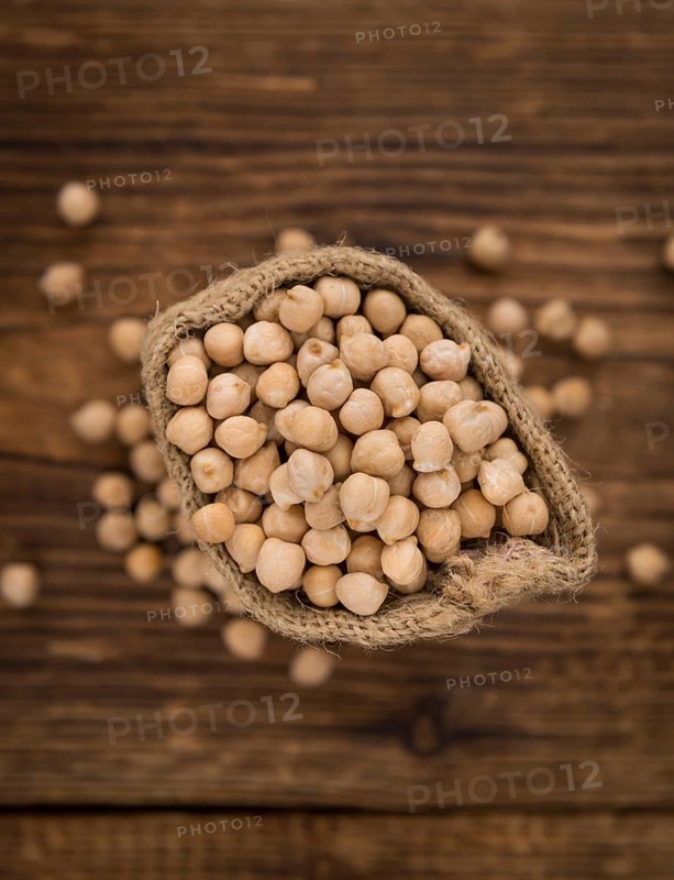 Portion of fresh Chickpeas close-up shot, selective focus