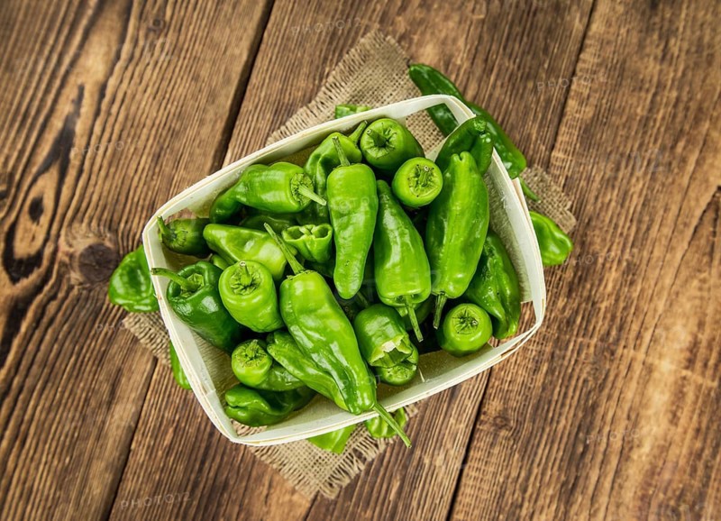 Portion of fresh Raw Pimientos close-up shot, selective focus