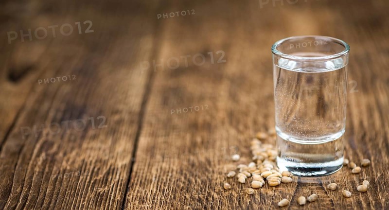 Portion of Wheat Liqueur as detailed close-up shot, selective focus