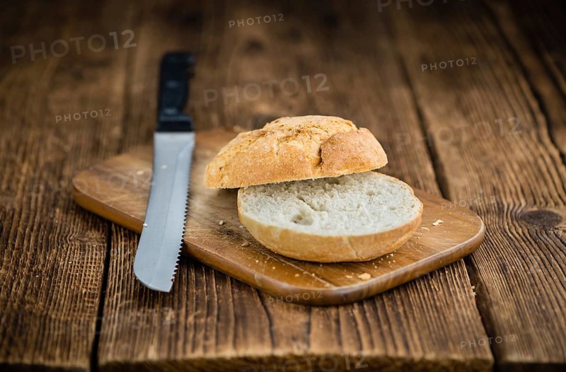 Rolls (German style) on rustic wooden background as close-up shot