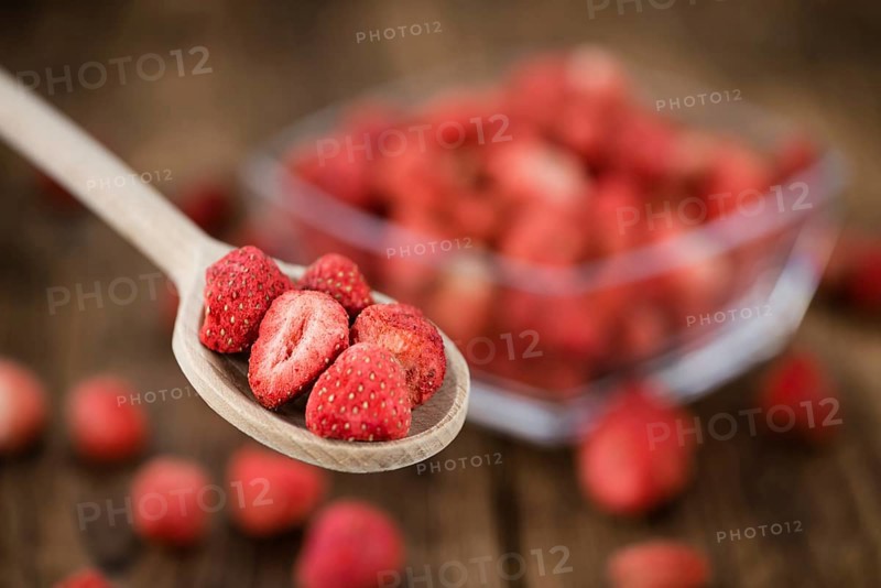 Dried Strawberries on a vintage background as detailed close-up shot, selective focus
