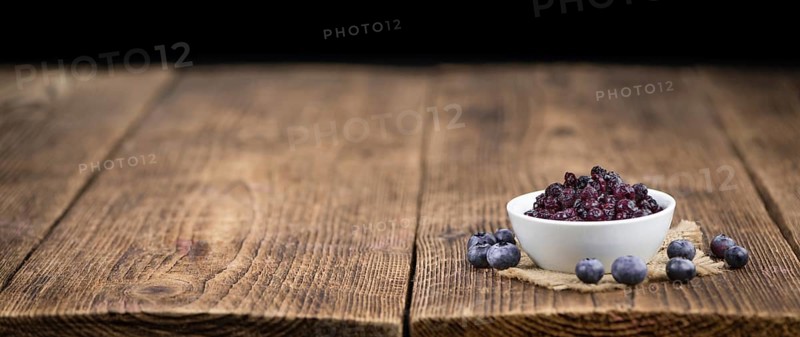 Fresh made Blueberries (preserved) on a vintage background as detailed close-up shot