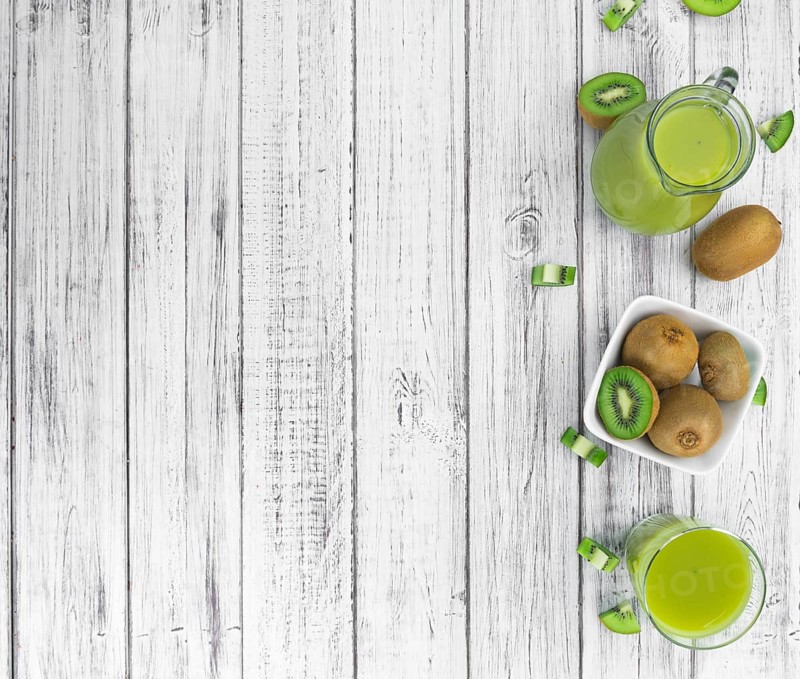Kiwi Smoothie (selective focus) on an old and vintage background (homemade)