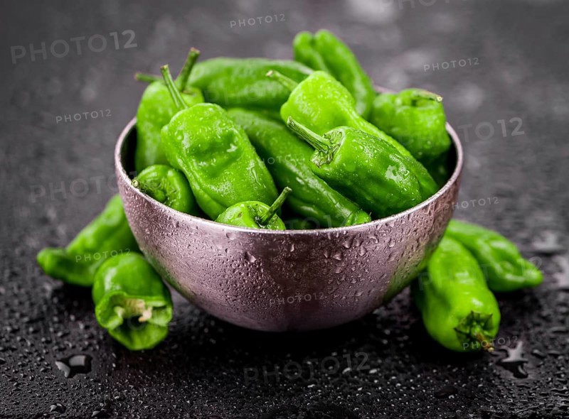 Portion of fresh Raw Pimientos close-up shot, selective focus