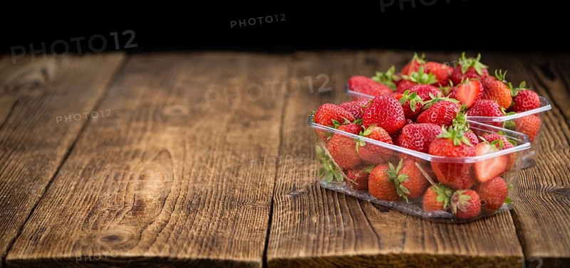 Portion of fresh Strawberries close-up shot, selective focus