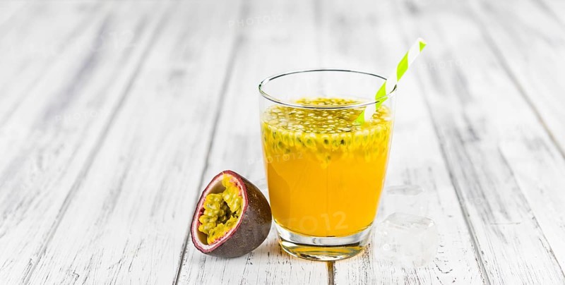Some healthy Maracuja Juice (selective focus, close-up shot)
