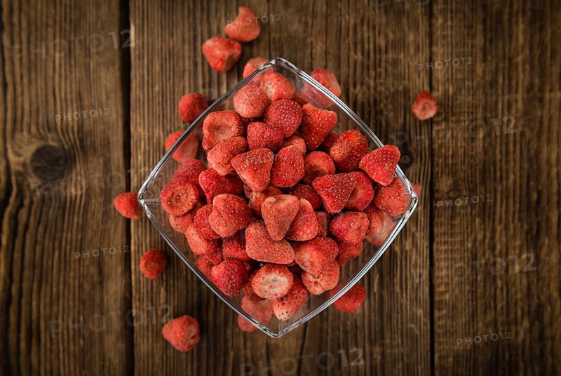 Dried Strawberries on a vintage background as detailed close-up shot, selective focus