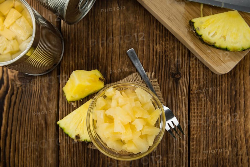 Portion of fresh Preserved Pineapple pieces close-up shot, selective focus