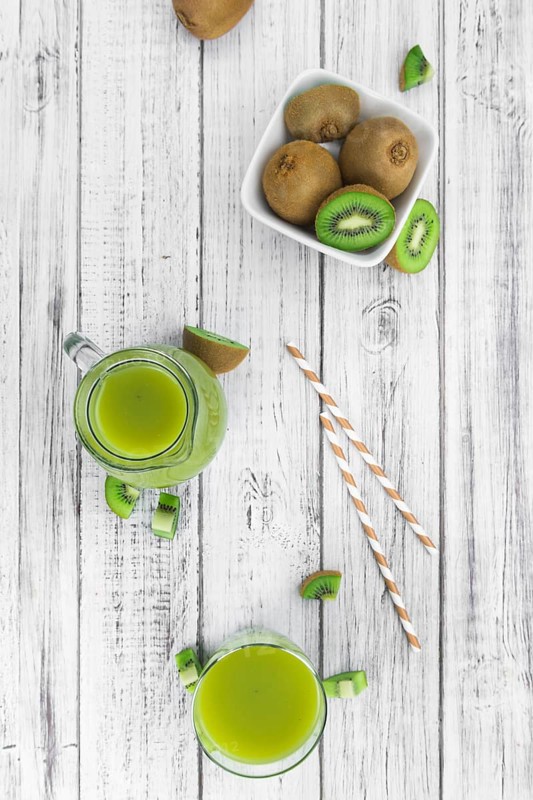 Kiwi Smoothie (selective focus) on an old and vintage background (homemade)
