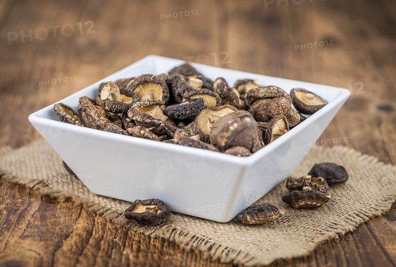 Some homemade Shiitake mushrooms (dried) as detailed close-up shot, selective focus