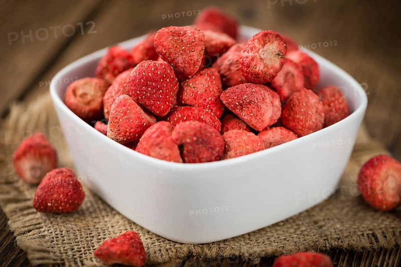 Dried Strawberries on a vintage background as detailed close-up shot, selective focus