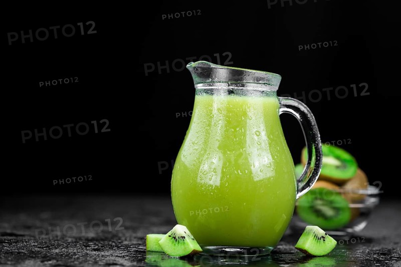 Fresh made Kiwi Smoothie (selective focus) on a vintage looking background
