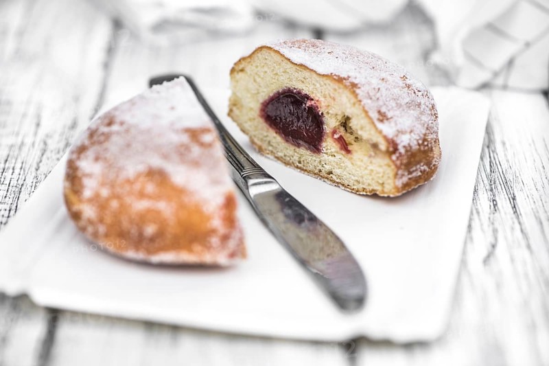 Portion of Berliner Doughnuts as detailed close-up shot, selective focus