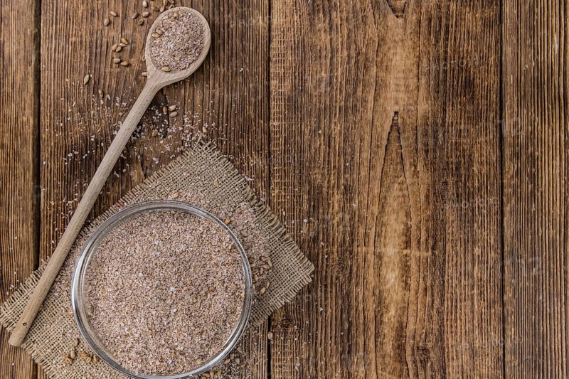 Fresh Wheat Bran as detailed close-up shot (selective focus)